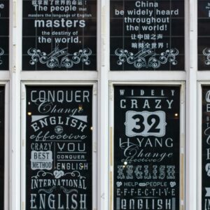 Decorative windows display English and Chinese typography with motivational phrases.